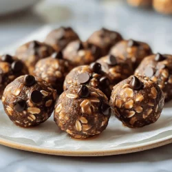 For Chocolate Peanut Butter Protein Balls, you need these simple ingredients: - 1 cup rolled oats - 1/2 cup natural peanut butter (smooth or crunchy) - 1/4 cup honey or maple syrup - 1/4 cup chocolate protein powder - 1/4 cup mini dark chocolate chips - 1 teaspoon vanilla extract - A pinch of sea salt - Optional: 2 tablespoons chia seeds These ingredients come together to create a tasty treat that packs a protein punch. The oats add bulk, while peanut butter brings that creamy flavor. Honey or maple syrup sweetens the mix, and chocolate protein powder boosts nutrition. - Rolled oats: They are great for heart health. Oats provide fiber that helps with digestion and keeps you full longer. - Natural peanut butter: This nut butter is rich in protein and healthy fats. It supports muscle growth and provides lasting energy. - Honey or maple syrup: Both are natural sweeteners. They offer quick energy and have antioxidants that can help fight inflammation. - Chocolate protein powder: This adds protein to your snack. Protein is key for muscle repair and recovery. - Mini dark chocolate chips: These chips add a bit of sweetness and antioxidants. Dark chocolate is known for improving mood too. - Vanilla extract: It adds a lovely flavor without extra calories. Vanilla can also have calming effects. - Sea salt: A pinch enhances all the flavors. It also helps balance electrolytes, especially after exercise. - Chia seeds (optional): They are packed with fiber, omega-3s, and protein. Chia seeds can help you feel full and support heart health. If you have special diet needs, you can easily swap some ingredients: - Gluten-free: Use certified gluten-free oats to keep the recipe safe for those with gluten allergies. - Nut-free: Substitute peanut butter with sunflower seed butter or another nut-free butter. - Vegan: Replace honey with maple syrup or agave nectar for a fully plant-based option. - Low-sugar: Use a sugar-free protein powder and lessen the sweetener to fit your diet. These alternatives keep the flavor and protein while meeting your needs. Make these protein balls fit your lifestyle! For the full recipe and instructions, check out the [Full Recipe]. To make these tasty protein balls, start by gathering your ingredients. In a large mixing bowl, combine: - 1 cup rolled oats - 1/4 cup chocolate protein powder - A pinch of sea salt If you want extra texture, add 2 tablespoons of chia seeds. Mix these dry ingredients well. Next, add your wet ingredients. This includes: - 1/2 cup natural peanut butter - 1/4 cup honey or maple syrup (for sweetness) - 1 teaspoon vanilla extract Use a spatula or your hands to mix until everything is combined. The mix should feel thick and sticky. When combining the ingredients, use your hands if you can. This helps you feel the texture better. Make sure all the dry ingredients are fully coated with the peanut butter and honey. This step is key for great flavor and texture. After mixing, gently fold in: - 1/4 cup mini dark chocolate chips Distribute the chocolate chips evenly through the mixture. This ensures you get a piece in every bite. Once the mixture is ready, take small portions and roll them into balls about 1 inch wide. Place the balls on a parchment-lined baking sheet. After you form all the balls, put the sheet in the fridge. Let the protein balls chill for at least 30 minutes. This helps them firm up and hold their shape. You can enjoy these protein balls right away or store them in an airtight container. They stay fresh in the fridge for up to one week. Try them as a quick snack or a post-workout treat. Enjoy your nutrient-packed delight from the full recipe! When making Chocolate Peanut Butter Protein Balls, some common mistakes can ruin your snack. First, don’t skip the chilling step. Chilling helps the balls hold their shape. If you skip it, they may fall apart. Second, avoid using too much liquid. If the mixture is too wet, the balls won’t form well. Lastly, don’t forget to mix well. You want every ingredient combined for the best flavor. You can easily customize these protein balls. Want more crunch? Use chunky peanut butter instead of smooth. You can also switch out the chocolate protein powder for vanilla or strawberry. For a unique twist, add different mix-ins. Try shredded coconut, dried fruit, or nuts. You can even change the sweetener. Use agave syrup or date syrup if you prefer something different. To make your protein balls even tastier, consider adding spices. A dash of cinnamon or a hint of sea salt can elevate the flavor. For extra richness, include a tablespoon of cocoa powder. This adds depth without too much sweetness. If you want a firmer texture, roll the balls in crushed nuts or seeds. This not only adds crunch but also makes them look appealing. Follow the Full Recipe for more tips on perfecting these delicious snacks. {{image_4}} You can switch up the taste of your protein balls. Try coconut for a tropical twist. Use almond butter instead of peanut butter for a nutty flavor. You can even mix in some cocoa powder for extra chocolate goodness. Adding different flavors keeps things fun and exciting! Want to boost the nutrition? Toss in some seeds like chia or flaxseeds. These add healthy fats and fiber. You can also mix in dried fruits like cranberries or raisins. They add sweetness and chewiness to the balls. Get creative with your add-ins for more health benefits! If you need vegan options, use maple syrup instead of honey. Choose a plant-based protein powder too. For gluten-free protein balls, ensure your oats are certified gluten-free. These changes make it easy for everyone to enjoy a tasty snack. You can easily adapt this recipe to fit different diets. Check out the Full Recipe for more ideas! To keep your chocolate peanut butter protein balls fresh, store them in the fridge. Use an airtight container to avoid moisture and keep them tasty. This method helps to lock in flavor and maintain texture for longer. Always let the balls cool completely before sealing them in the container. These protein balls last up to one week in the fridge. If you want to enjoy them longer, freeze them! Place the balls in a single layer on a baking sheet. Once frozen, transfer them to a freezer-safe bag or container. They can last for up to three months in the freezer. When you're ready to enjoy, just thaw them in the fridge overnight. To keep chocolate peanut butter protein balls fresh, avoid adding too much sweetener. Too much moisture can make them soggy. If you plan to eat them throughout the week, consider making smaller batches. This way, you can enjoy them fresh each time. Another tip is to add a pinch of sea salt to enhance flavor and help preserve them. These protein balls stay fresh for up to one week in the fridge. Store them in an airtight container. This keeps them safe from moisture and helps maintain their texture. You can also freeze them for longer storage. If frozen, they can last for about three months. Just let them thaw in the fridge before enjoying. Yes, you can use any protein powder you like. Whether it's whey, plant-based, or casein, the choice is yours. Each powder has a unique taste and texture. Just remember that it might change the flavor of your protein balls. Experiment with flavors like vanilla or berry for a fun twist. One protein ball contains about 100 calories. This can vary based on your specific ingredients. If you make them smaller or larger, the count will change too. You can reduce calories by using less sweetener or chocolate chips. These protein balls are a healthy snack, packed with energy and nutrients. In this blog post, we explored protein balls' key ingredients and health benefits. You learned preparation steps, mixing techniques, and storing tips to keep them fresh. We also discussed common mistakes, flavors, and add-ins to customize your snacks. Remember, making protein balls can be fun and simple. With these tips, you can enjoy healthy snacks that fit your needs. Get creative, stay healthy, and enjoy every bite!